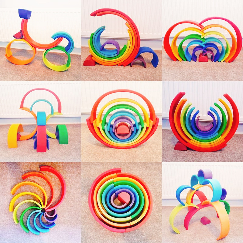 12-Piece Wooden Rainbow Stacking Tunnel Toys combined into various shapes 12-Piece Wooden Rainbow Stacking Tunnel Toys combined into various shapes