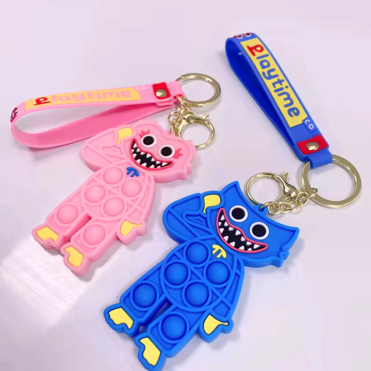 Huggy Wuggy Pop It Keychain Blue and Pink Luminous models Huggy Wuggy Pop It Keychain Blue and Pink Luminous models